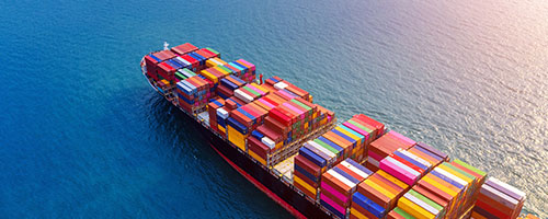 Cargo ship with containers at sea